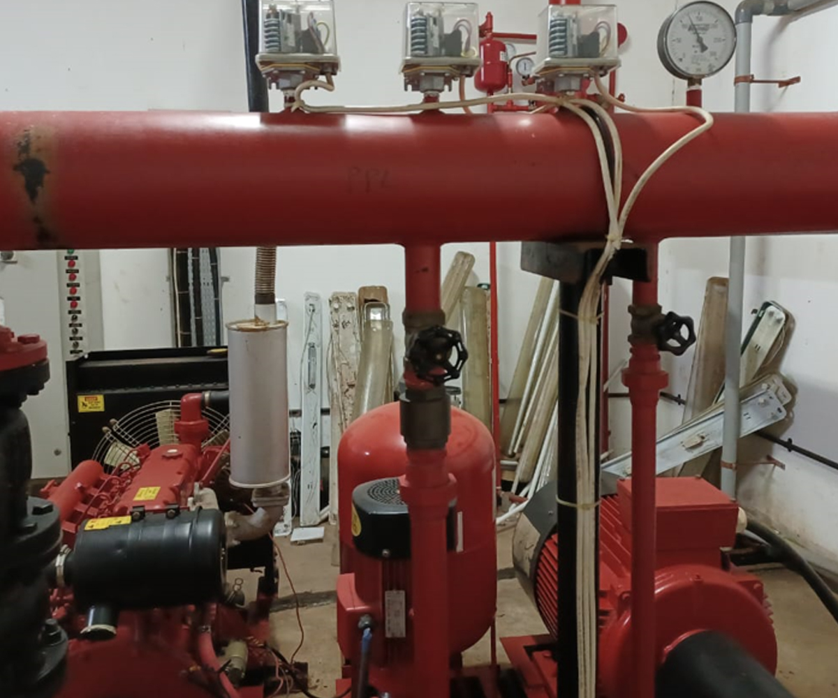 automatic extinguishing system (AES) that prevents fire growth and spread by releasing water through a series of sprinkler heads